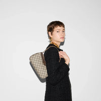 Borsa a tracolla con motivo a tela